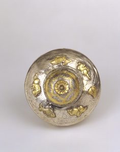 A silver-gilt container