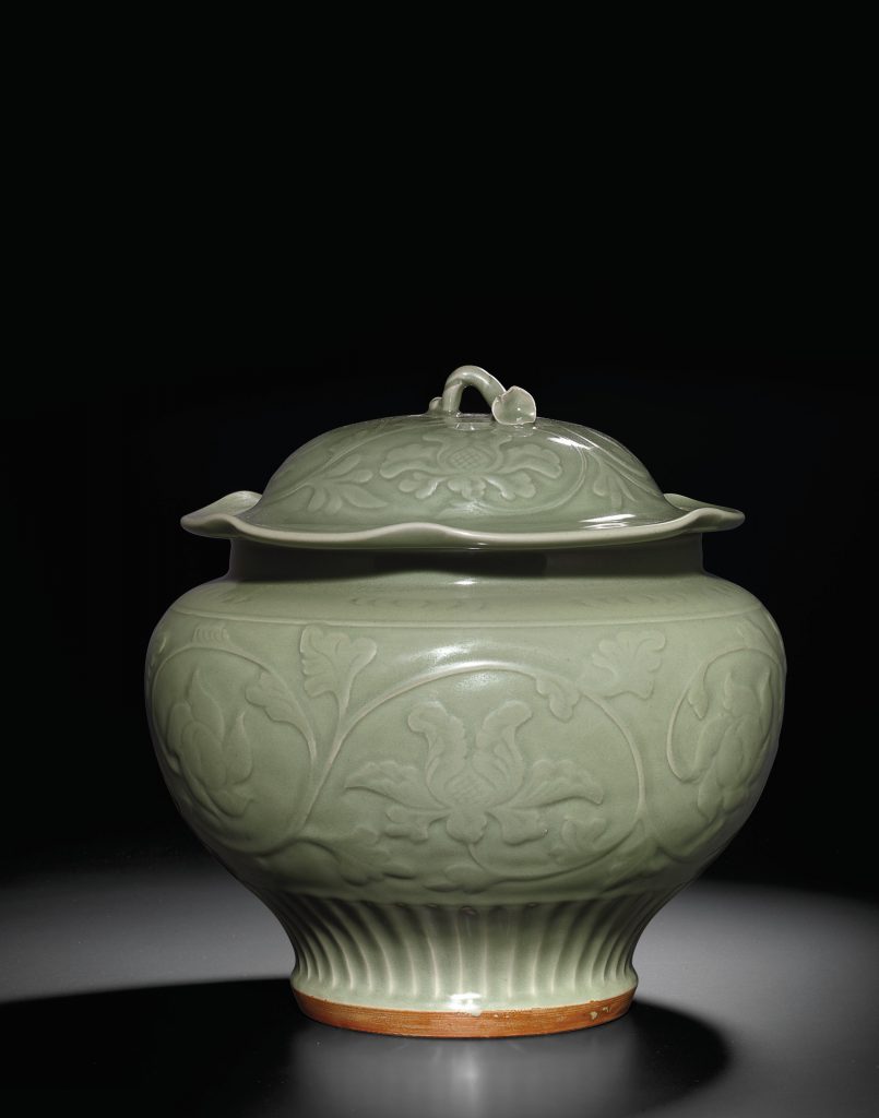 A carved Longquan celadon jar and cover (Yuan/early Ming Dynasty)