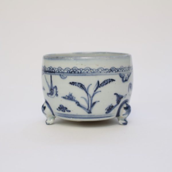 A small blue and white censer