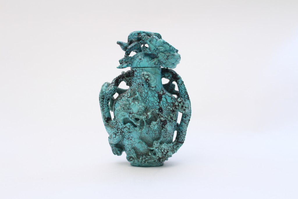 A turquoise dragon vase and cover