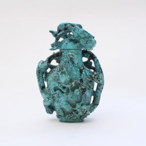 A turquoise dragon vase and cover