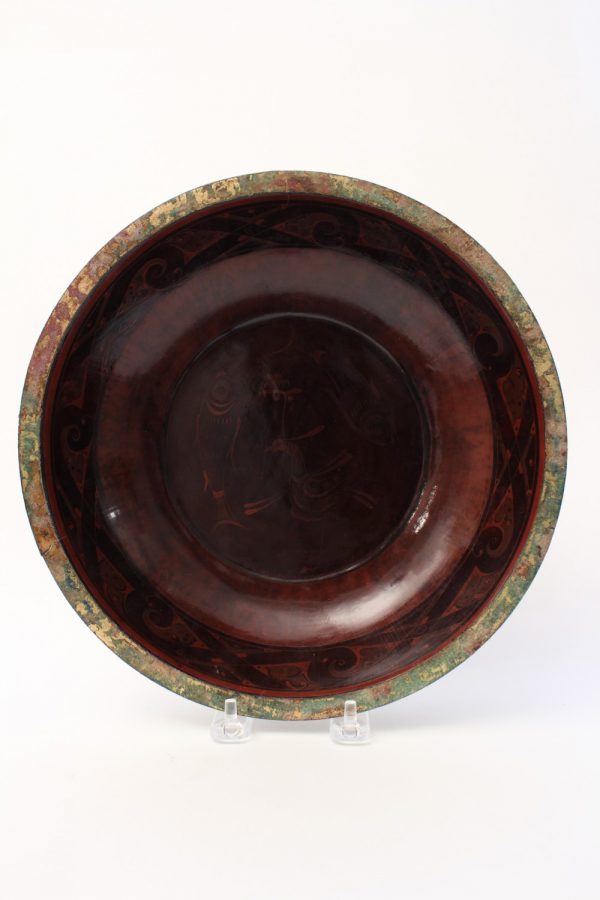 A painted brown lacquer circular basin