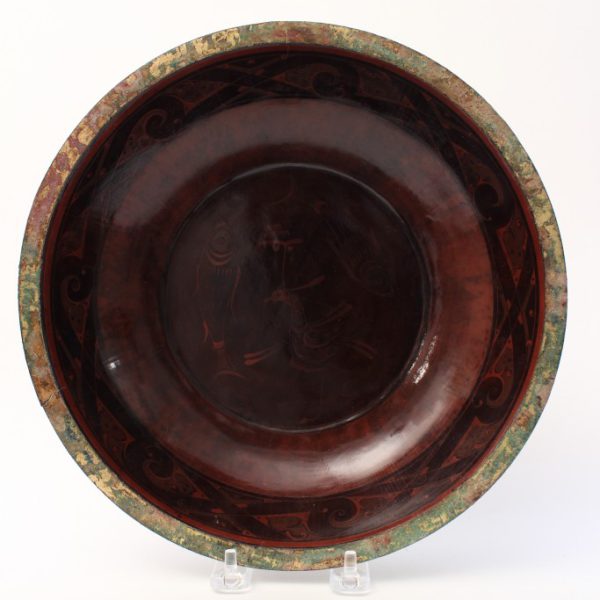 A painted brown lacquer circular basin