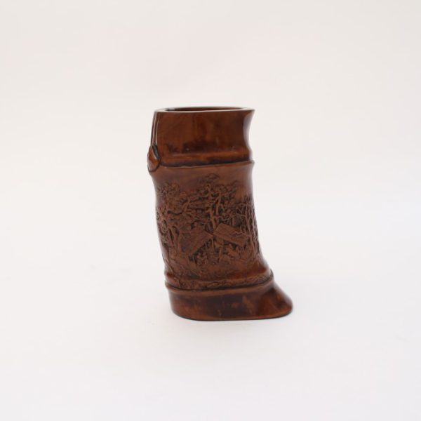 A small carved boxwood brush pot