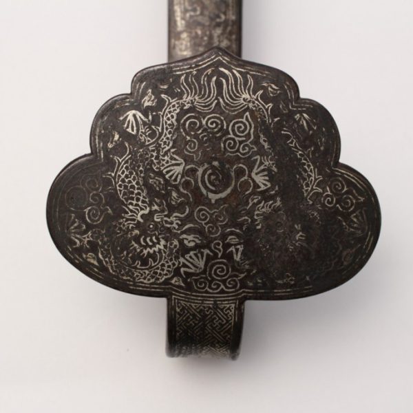 A silver-inlaid bronze 'ruyi' sceptre