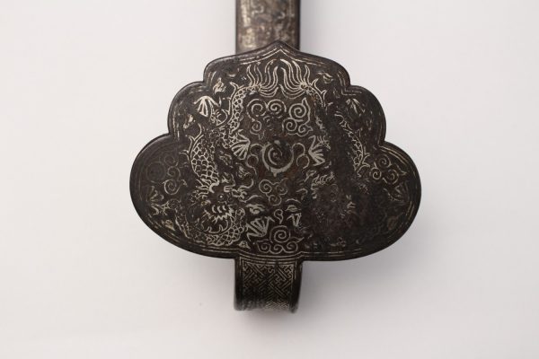 A silver-inlaid bronze 'ruyi' sceptre