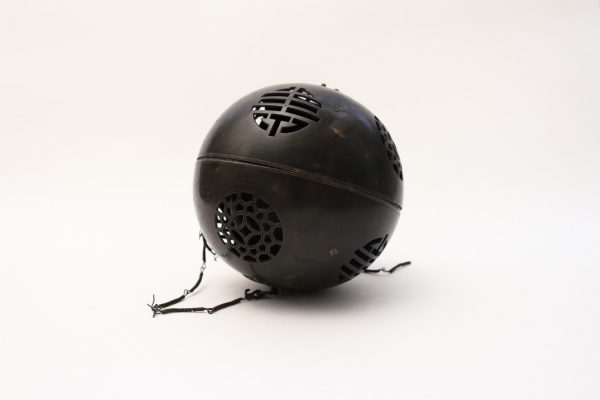 A bronze openwork spherical incense burner