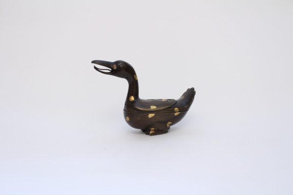 A gilt-splashed bronze 'goose' incense burner