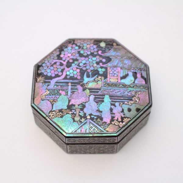 An octagonal mother-of-pearl inlaid box and cover