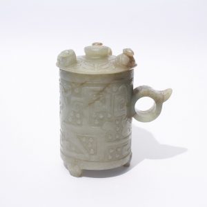 An archaic jade cup and cover