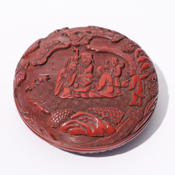 A carved cinnabar lacquer circular box and cover