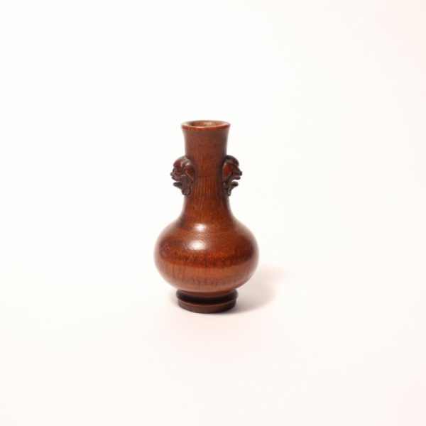 A small bamboo tool vase