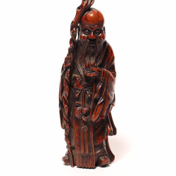 A carved bamboo figure of ‘Shoulao'