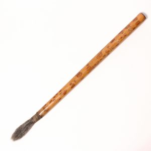 A bamboo inscribed calligraphy brush