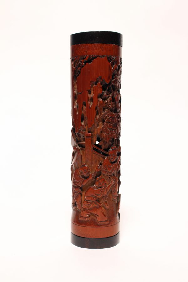 A carved bamboo 'Lady and Three Boys' incense holder