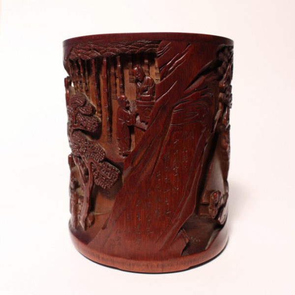 A superbly carved bamboo 'Seven Sages of the Bamboo Grove' brush pot 