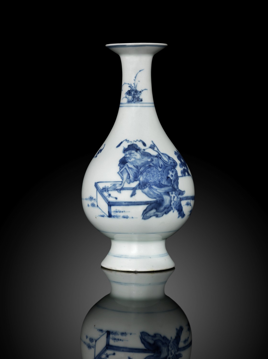 A small blue and white 'sage' bottle vase (Yongzheng mark and period)