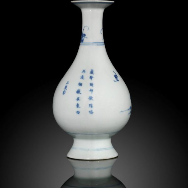 A small blue and white 'sage' bottle vase (Yongzheng mark and period)