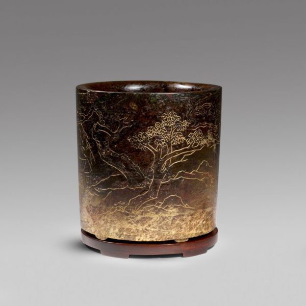 An important incised and gilt burnt jade brush pot