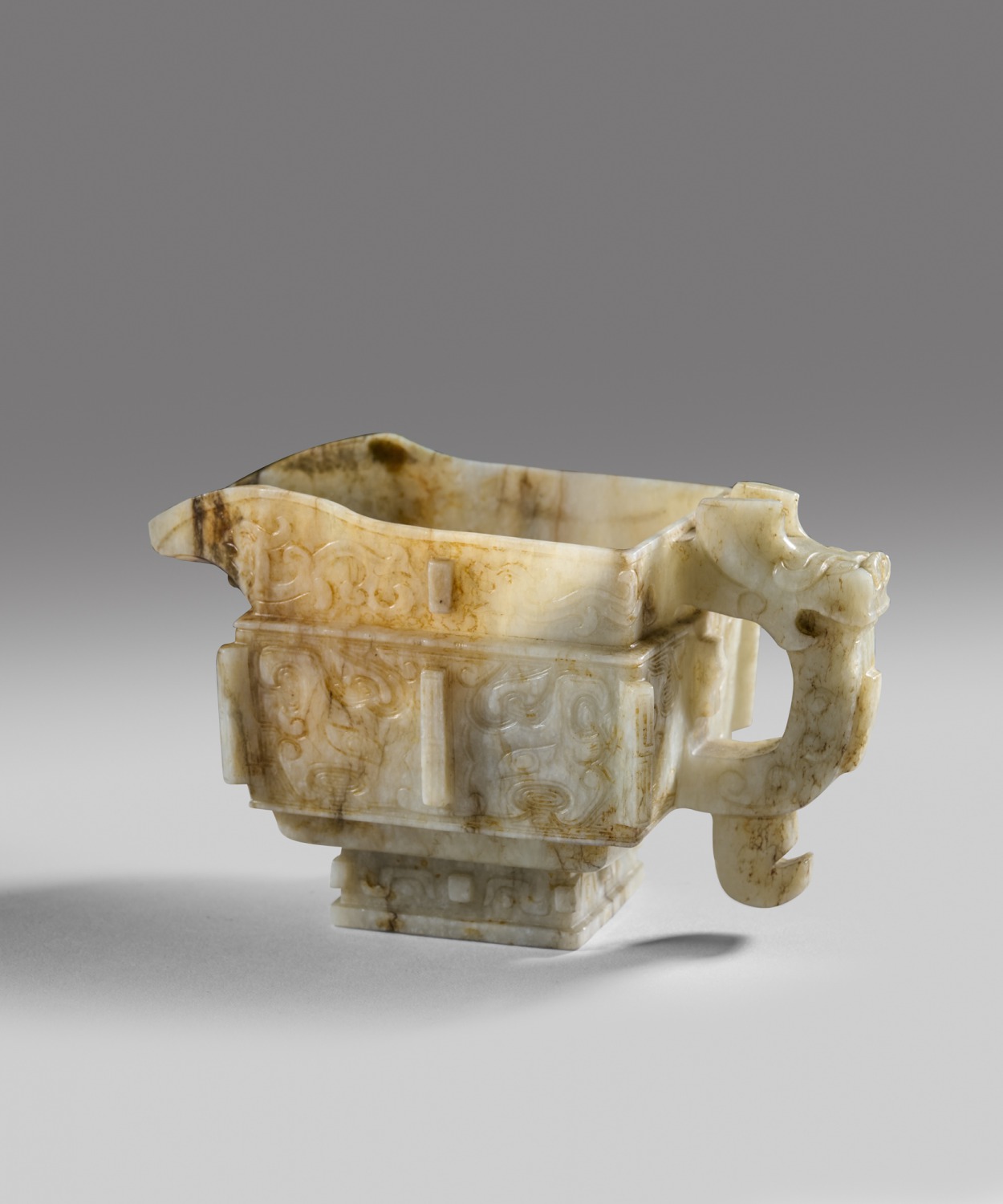 An archaistic jade ritual pouring vessel, 'gong'