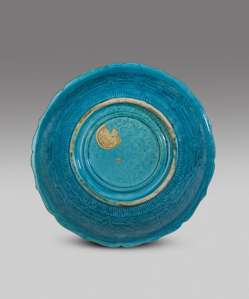 A large turquoise-glazed bowl