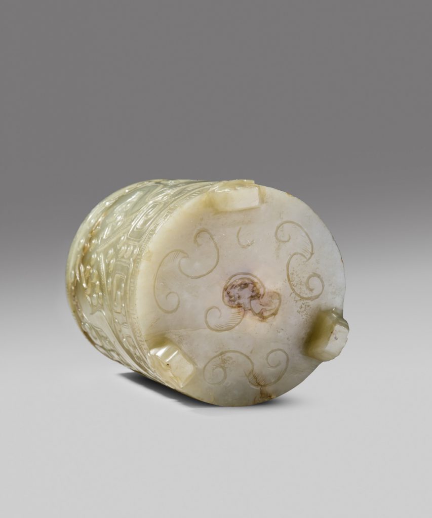 A carved celadon jade archaistic cup and cover (Ming dynasty, around 1600)