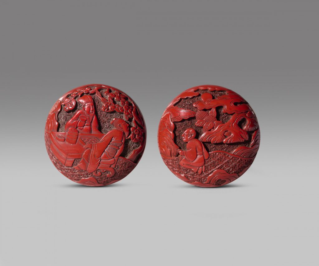 A miniature carved cinnabar lacquer 'figures' box and cover