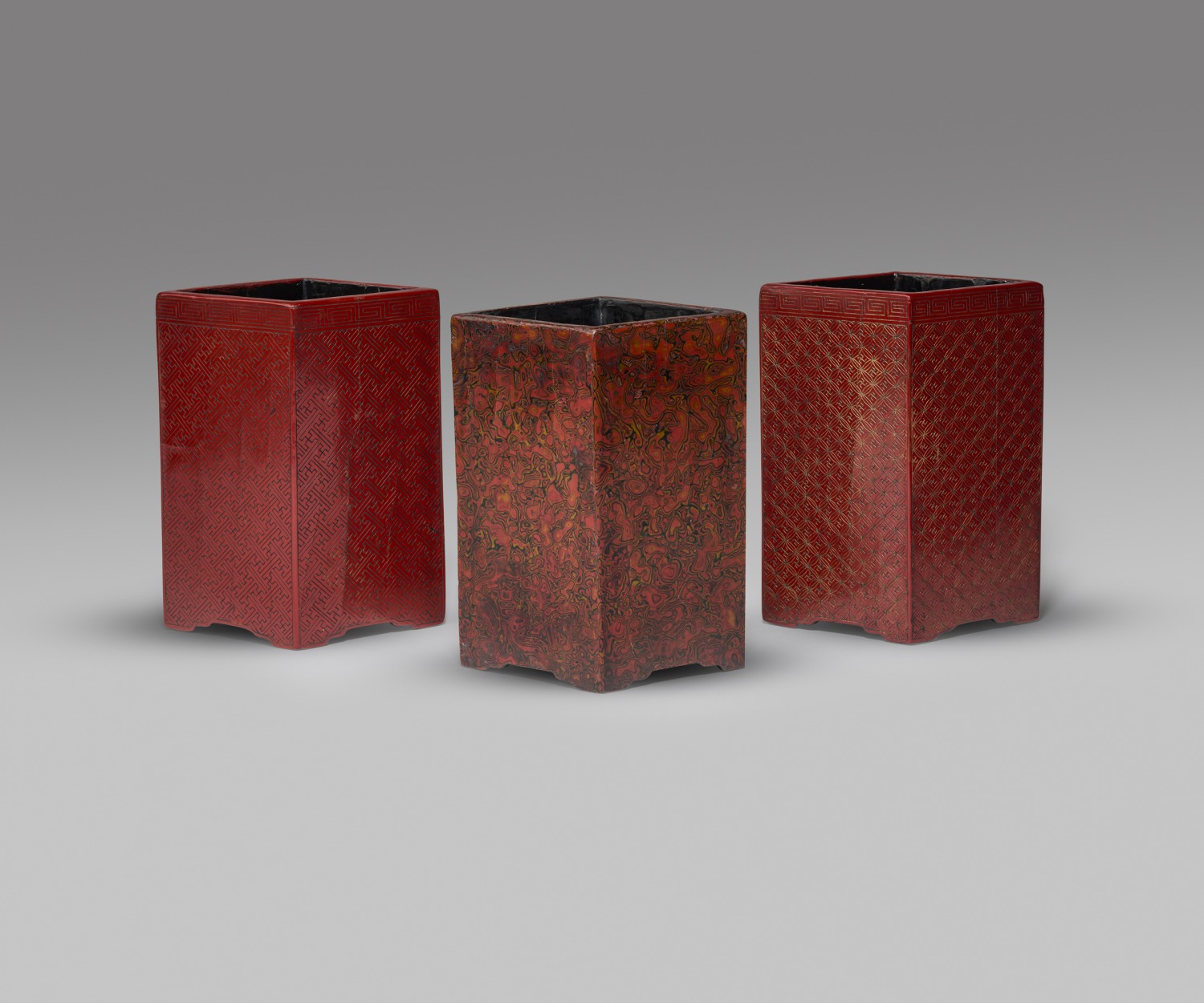 A GROUP OF THREE RHOMBIC OR DIAMOND SHAPED LACQUER BRUSH POTS