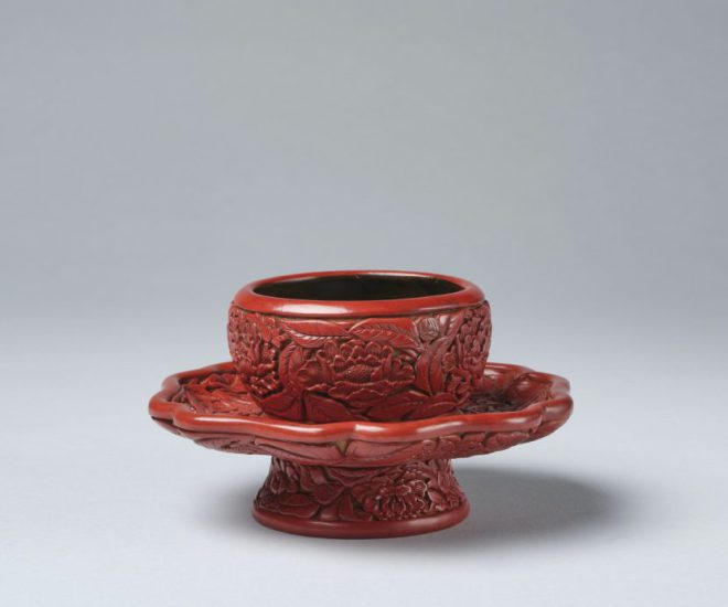 An important carved red lacquer cup stand (Ming dynasty, Yongle mark and period, 1403-1424)