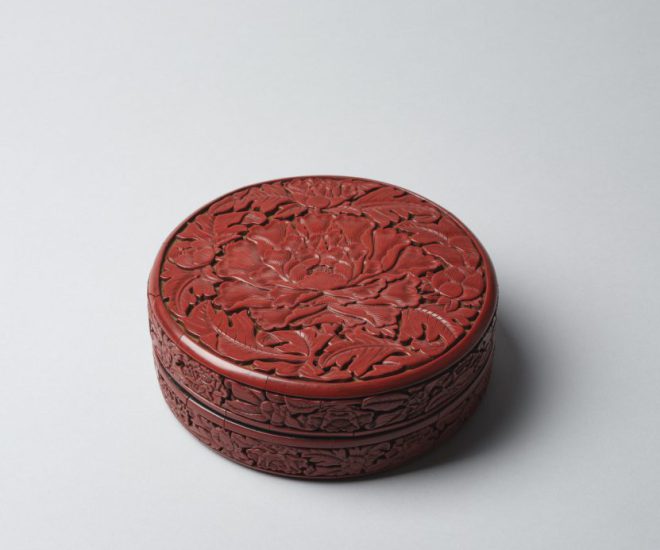 A superbly carved red lacquer ‘peony’ box (Yongle mark and period, 1403-1424)