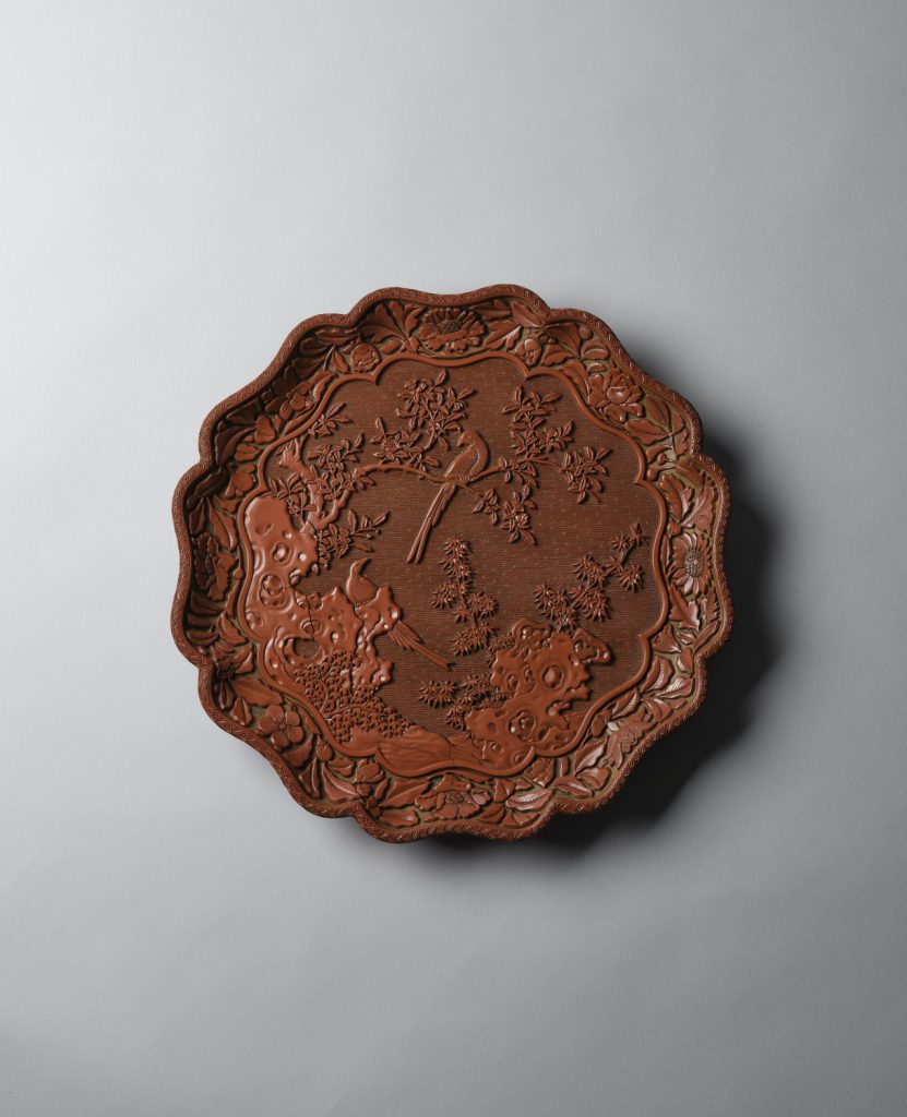 An extremely rare and important octagonal lacquer 'bird' plate with 'Zhang Cheng' maker's mark (Yuan dynasty, 14th century)
